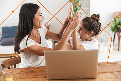 Happy Mom and Kid on laptop