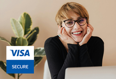 woman on laptop Visa Secure logo