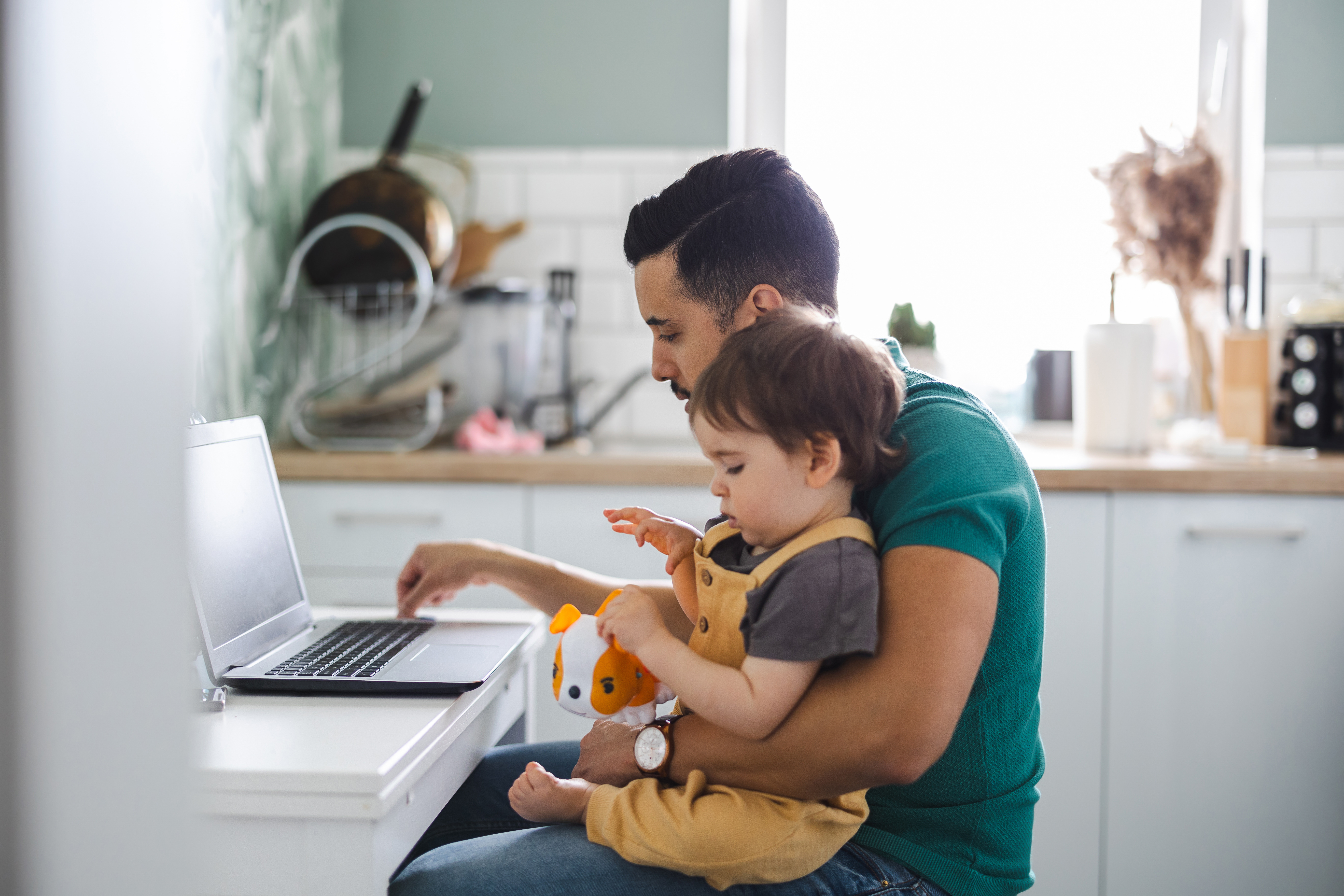 Dad and baby at computer